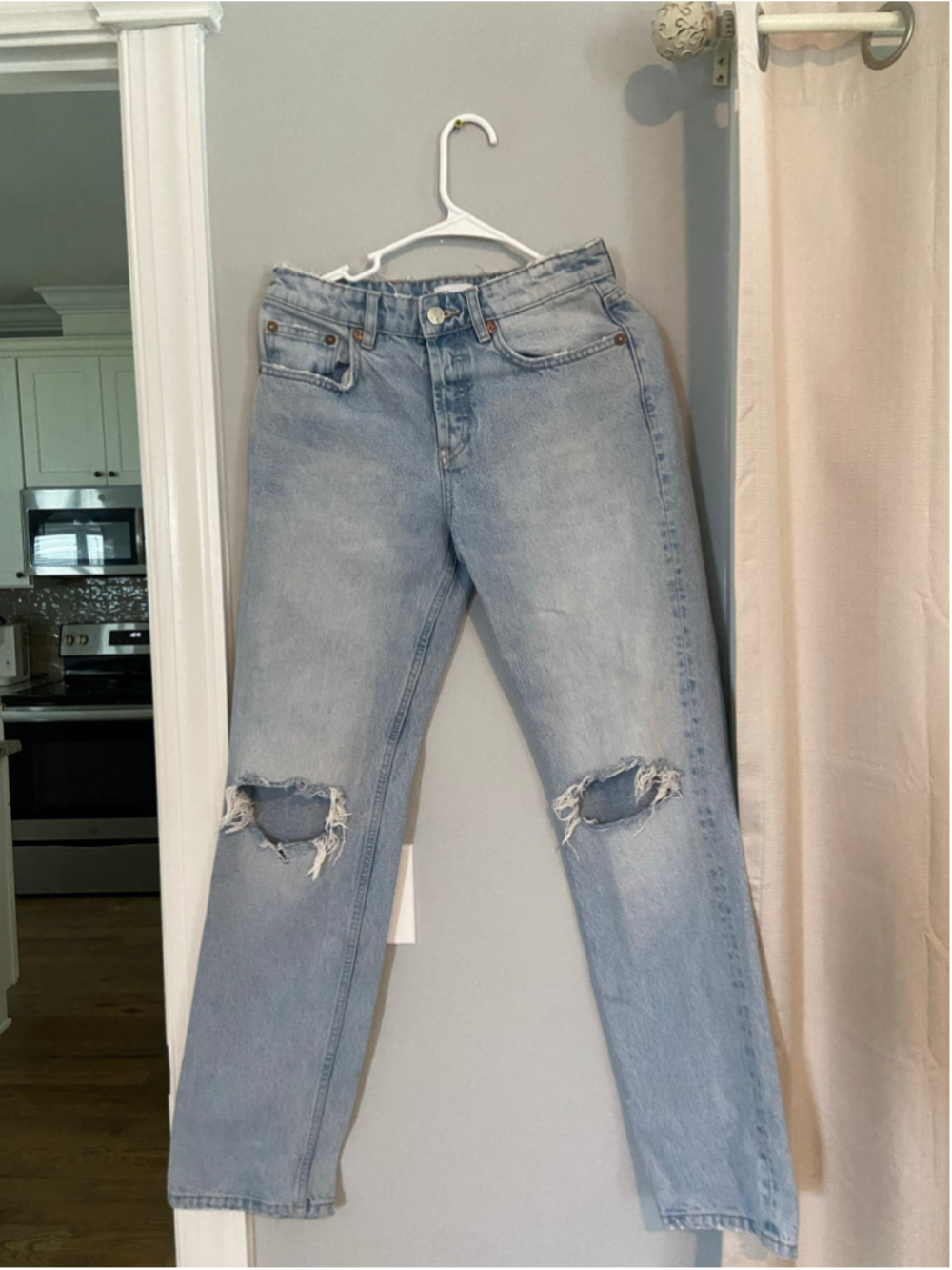 Distressed light wash jeans by Zara, size 4, ripped, retro